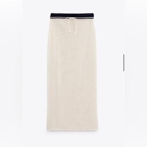 Zara
COMBO LETTER POLO
Matching skirt